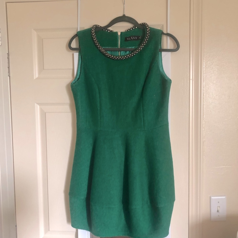 Green wool dress.